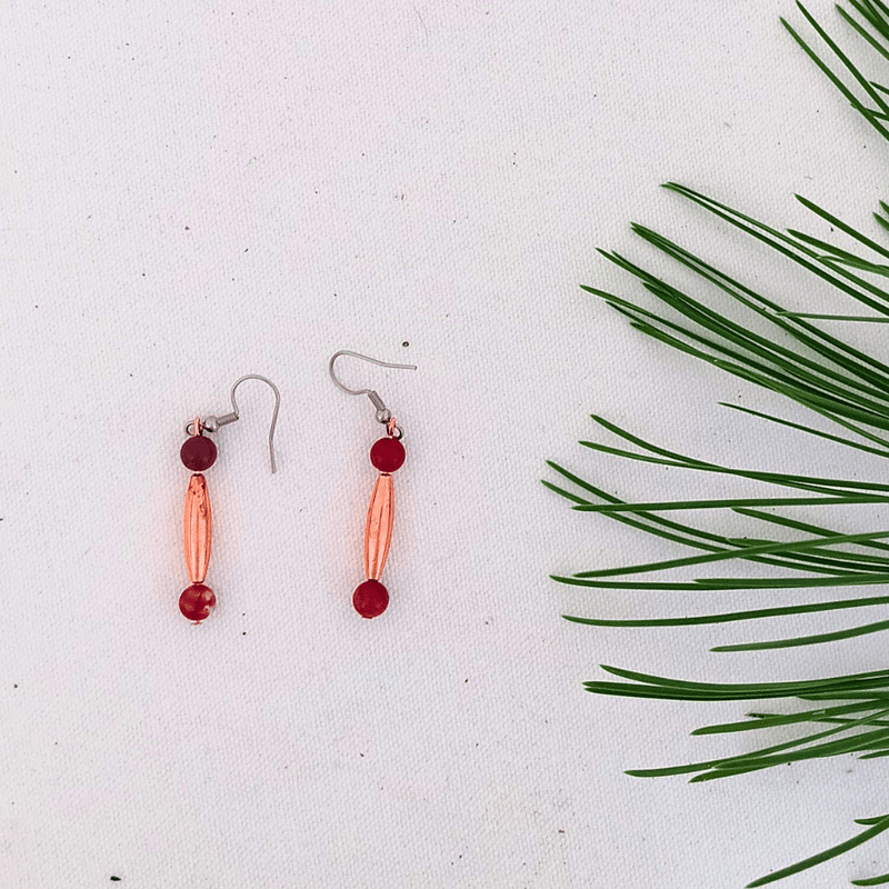 Red beaded earrings with copper accents