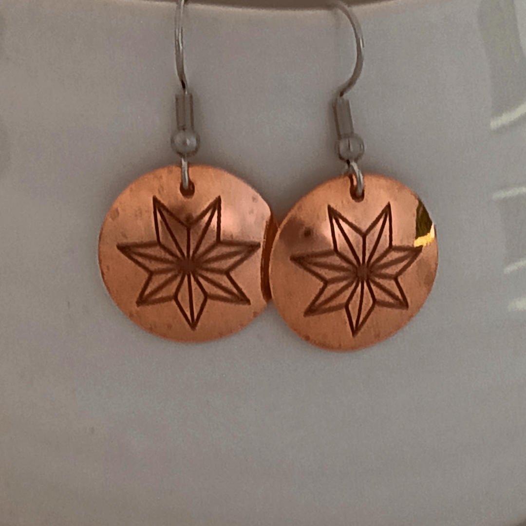 Cherokee Star copper earrings with the 7-pointed star, handmade by Cherokee Copper